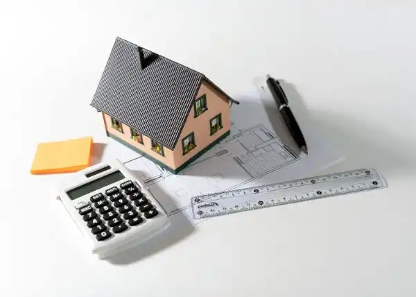 model house, calculator, and estate plan documents for a Vancouver, WA client