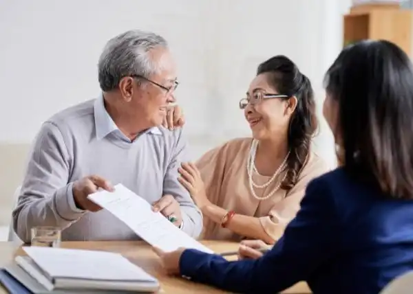 elder law attorney consulting with a senior couple in Salmon Creek, WA