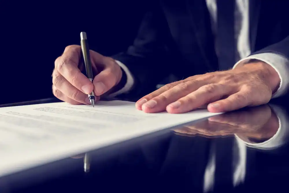 attorney signing a revocable trust document for a Portland, OR client